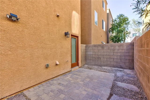 view of home's exterior featuring a patio area