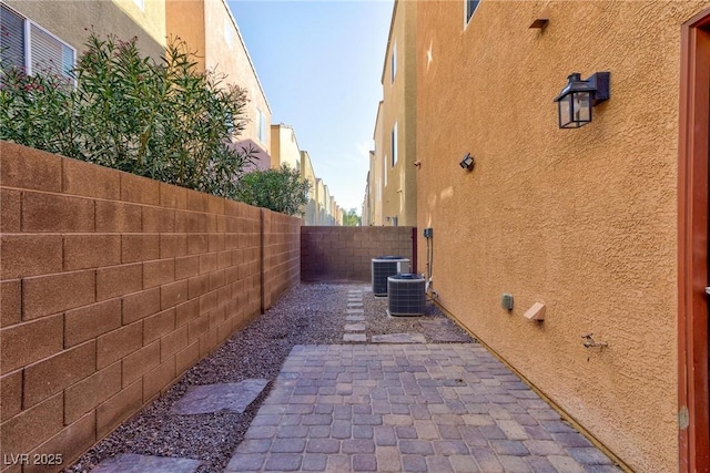 view of property exterior with a patio