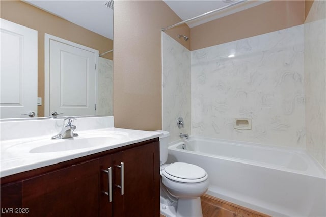 full bathroom with vanity, shower / bathing tub combination, and toilet