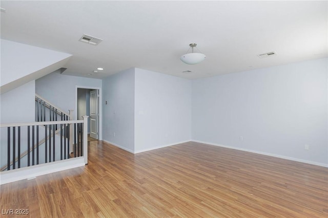 unfurnished room featuring light hardwood / wood-style flooring