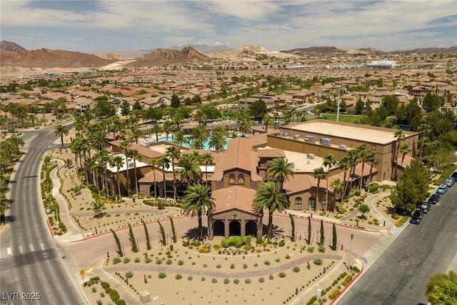 birds eye view of property featuring a mountain view