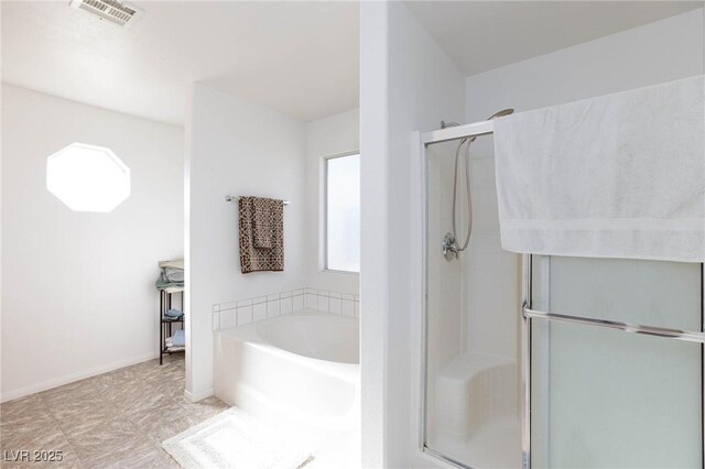 bathroom with independent shower and bath