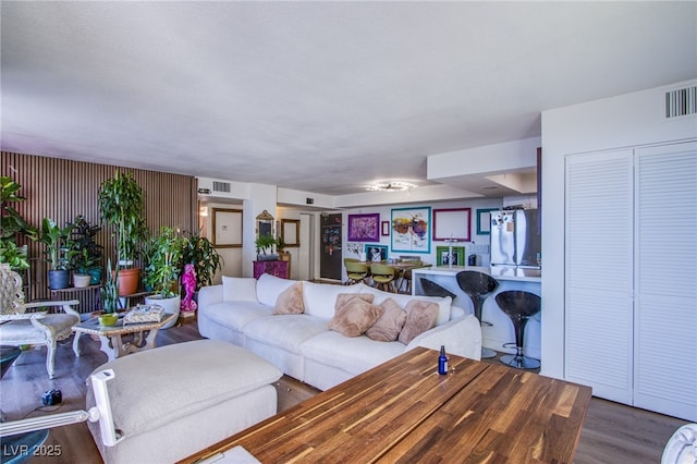 living room with hardwood / wood-style floors