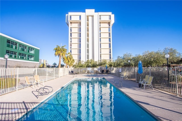 view of swimming pool with a patio area