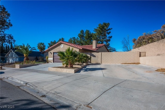 view of front of home featuring a garage