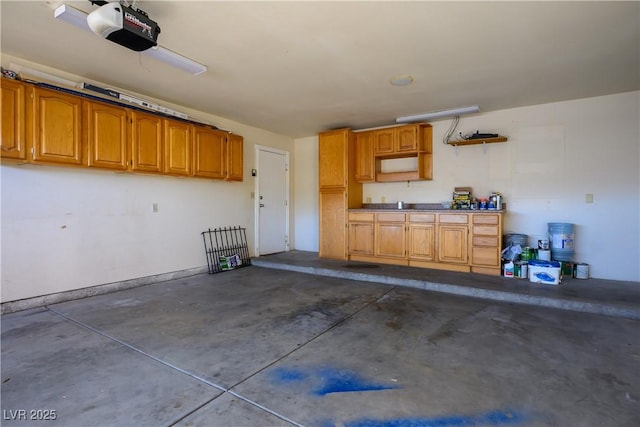 garage featuring a garage door opener