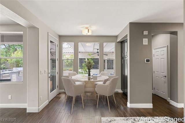 dining room featuring dark hardwood / wood-style flooring