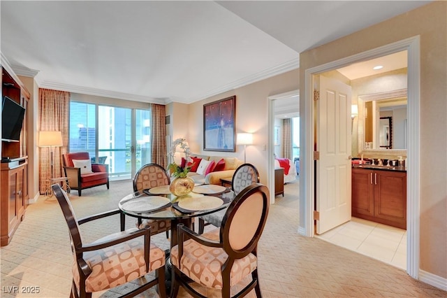 dining area featuring ornamental molding