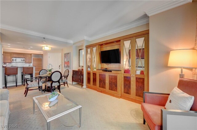 living room featuring crown molding