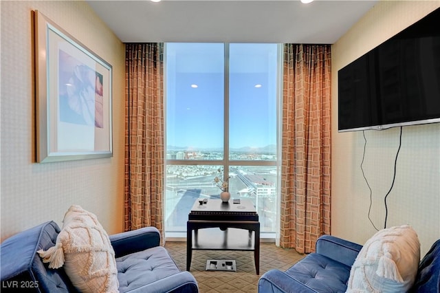 living room featuring expansive windows