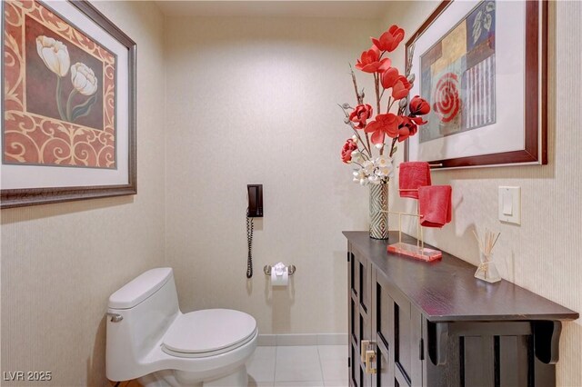 bathroom featuring tile patterned floors and toilet