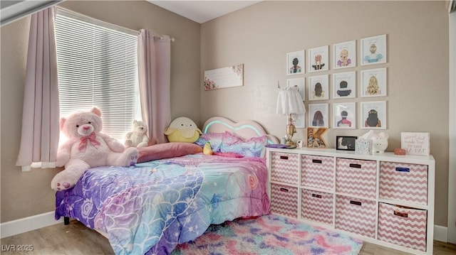 bedroom featuring light wood-type flooring