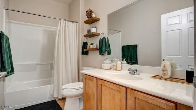 full bathroom with shower / bath combination with curtain, vanity, and toilet