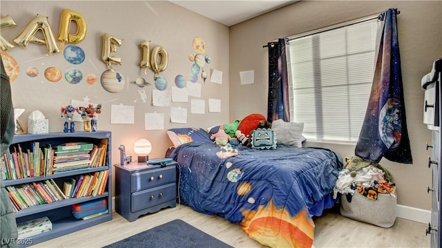 bedroom featuring light hardwood / wood-style floors