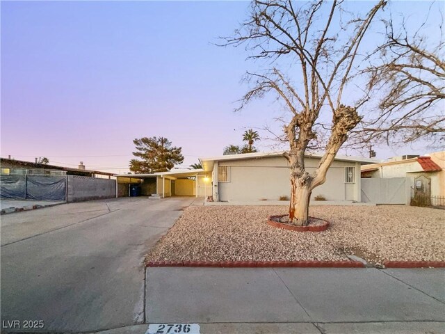 view of front of house with a carport