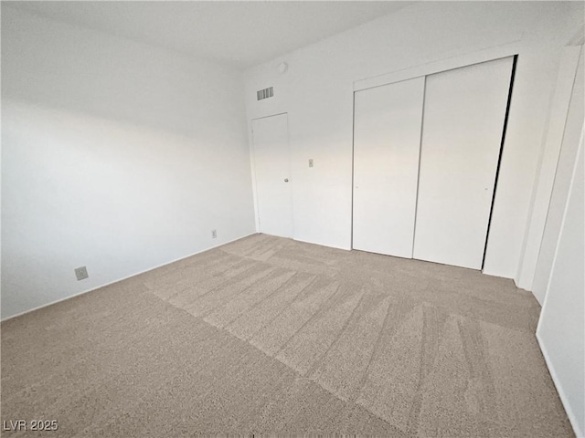 unfurnished bedroom with carpet