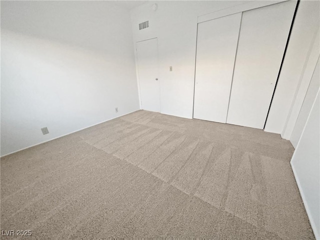 unfurnished bedroom with carpet floors