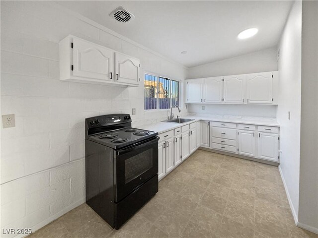 kitchen featuring sink, white cabinetry, ornamental molding, and black electric range oven