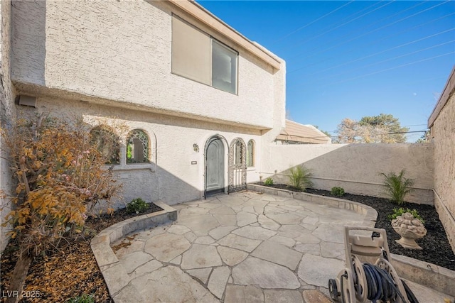 back of house with a patio area