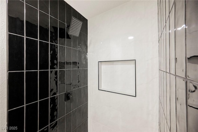 room details featuring a tile shower