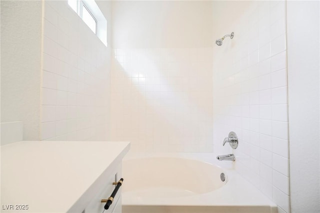 bathroom with shower / bathing tub combination