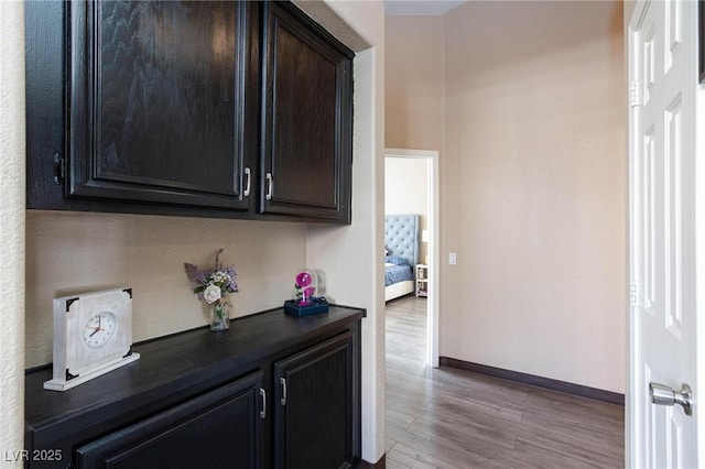 hallway featuring light hardwood / wood-style flooring