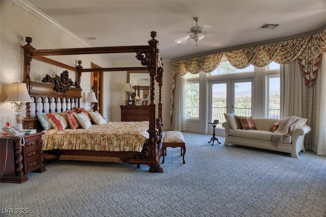 bedroom featuring french doors, ceiling fan, crown molding, and carpet