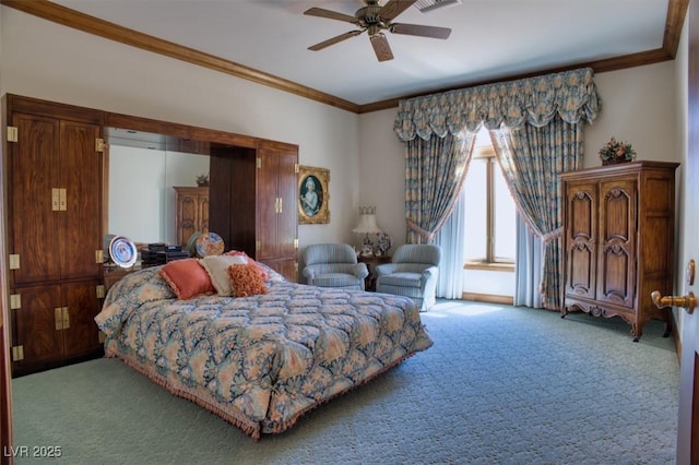 carpeted bedroom featuring ceiling fan and crown molding