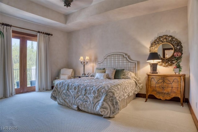 bedroom featuring carpet floors, access to outside, and baseboards