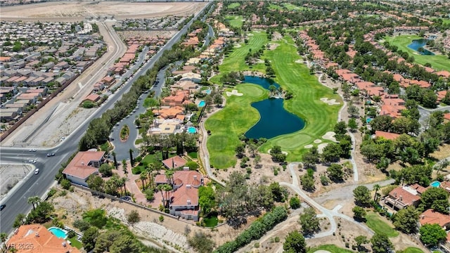 birds eye view of property featuring a water view, a residential view, and golf course view