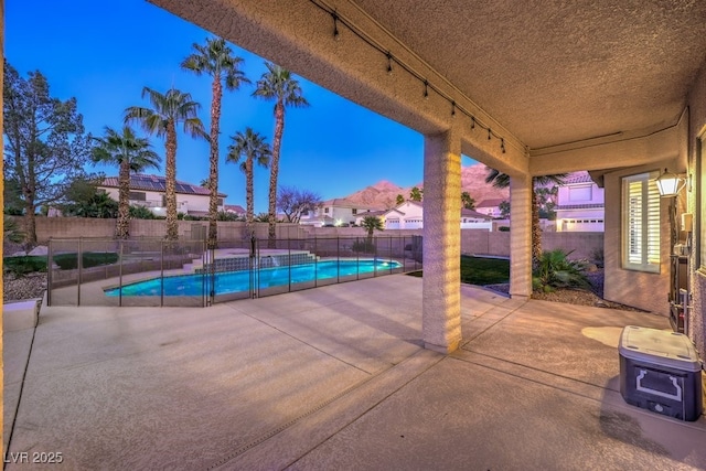 exterior space featuring a fenced in pool