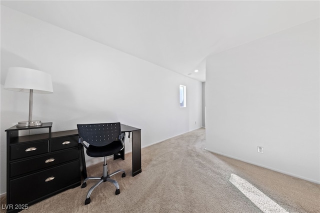 office with light colored carpet and baseboards