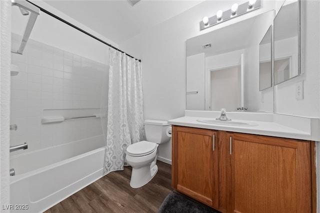 full bath with visible vents, shower / bathtub combination with curtain, toilet, vanity, and wood finished floors