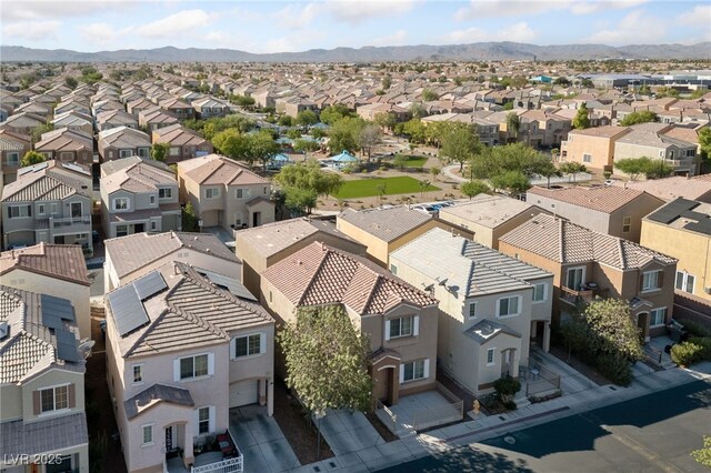 drone / aerial view featuring a mountain view