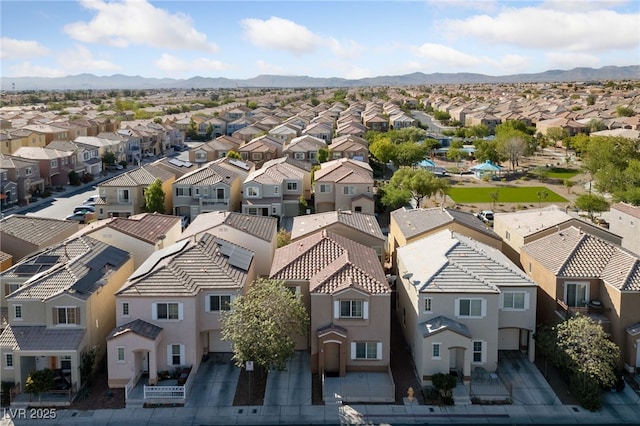 bird's eye view featuring a residential view and a mountain view