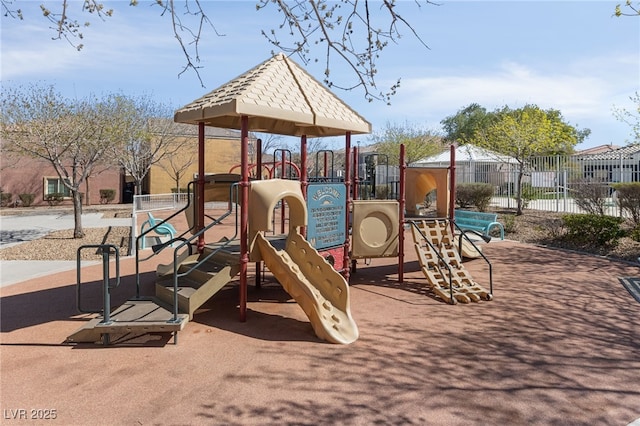 community jungle gym with fence