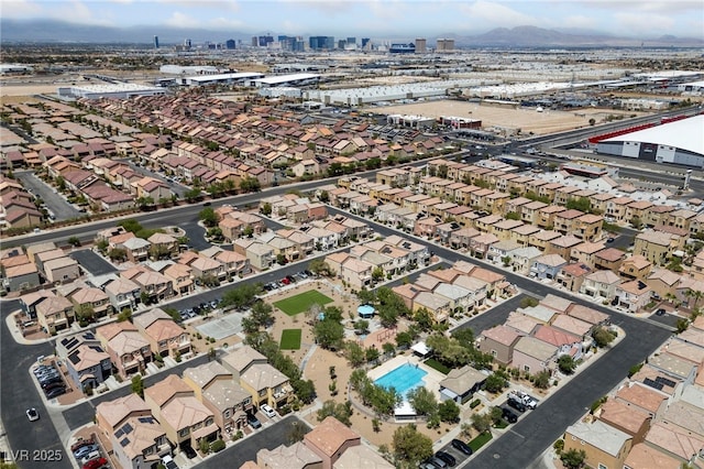 birds eye view of property featuring a residential view and a city view