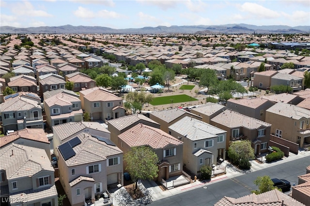 bird's eye view featuring a residential view and a mountain view