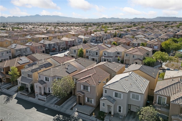 aerial view with a residential view and a mountain view