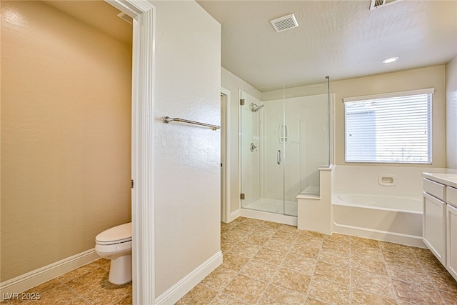 full bathroom featuring toilet, tile patterned floors, independent shower and bath, and vanity