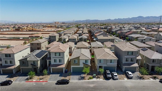 drone / aerial view featuring a mountain view