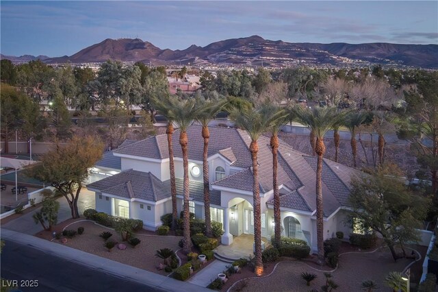 aerial view at dusk with a mountain view