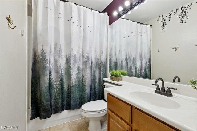 full bathroom featuring vanity, shower / bath combination with curtain, tile patterned floors, and toilet