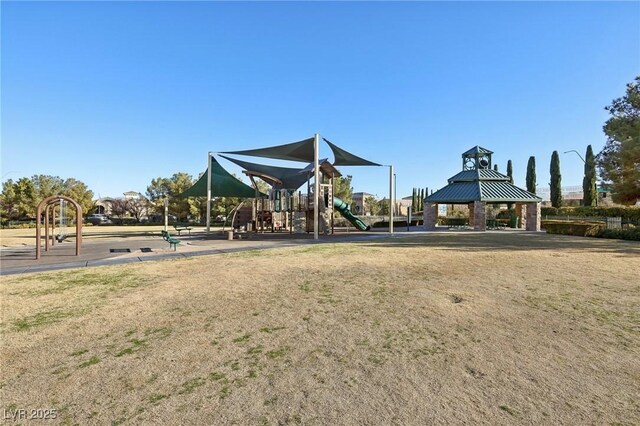 view of jungle gym with a lawn and a gazebo