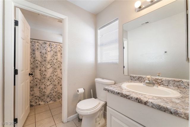 bathroom with toilet, tile patterned flooring, a shower with curtain, and vanity