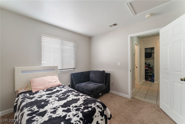 bedroom with light carpet