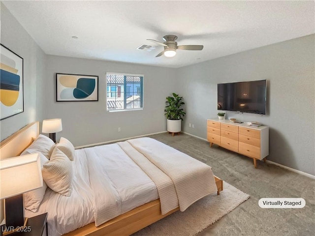 carpeted bedroom with ceiling fan