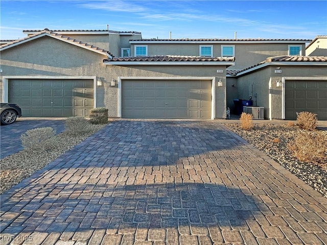 view of front of property featuring cooling unit