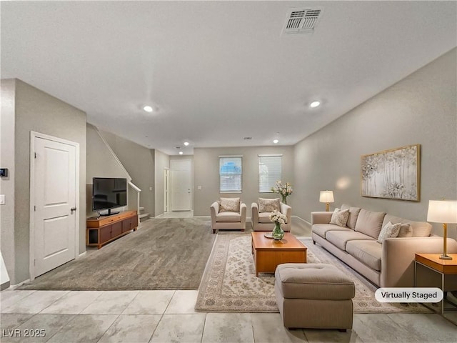 living room with light tile patterned flooring