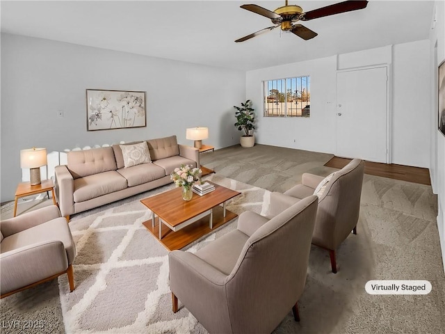 living room featuring ceiling fan